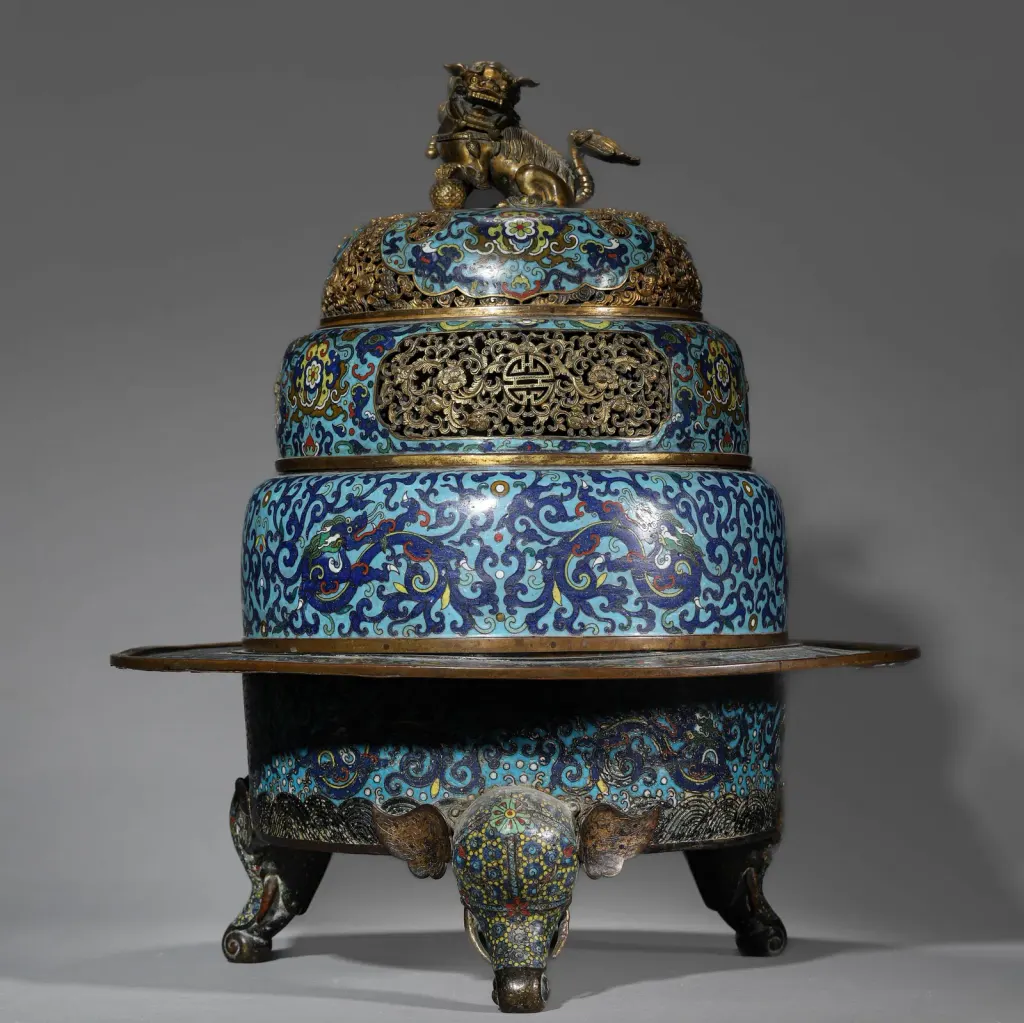 A Chinese cloisonné incense burner with lion knob and three elephant feet