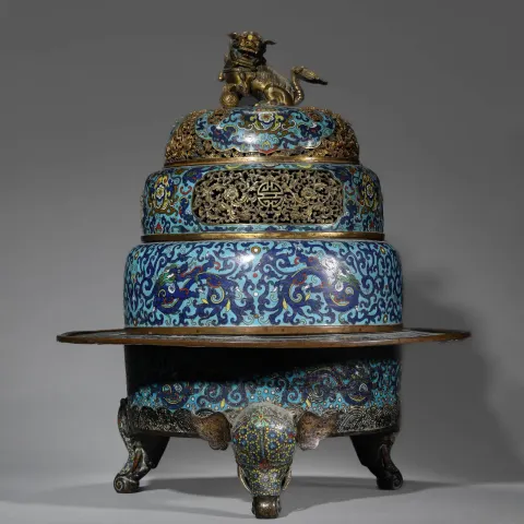 A Chinese cloisonné incense burner with lion knob and three elephant feet